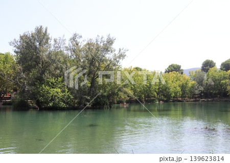 Small Boats Navigating the Calm Waters of Anna Lagoon, Spain 139623814