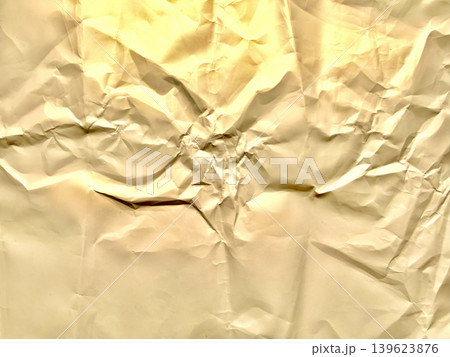 crumpled beige paper texture reveals dramatic central tear radiating chaotic organic wrinkle under warm natural light crumpled beige paper texture reveals dramatic central tear radiating chaotic organic wrinkle under warm natural light 139623876