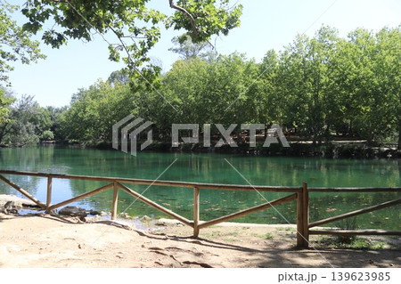 Wooden Fence Overlooking the Turquoise Waters of Anna Lake, Spain 139623985
