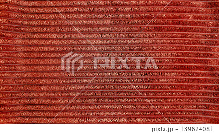 corduroy ribbed fabric macro texture closeup showcasing intricate horizontal ridges in rich terracotta warm earthy tones corduroy ribbed fabric macro texture closeup showcasing intricate horizontal ridges in rich terracotta warm earthy tones 139624081