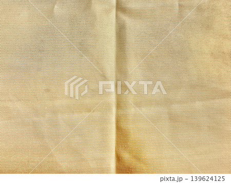 wrinkled beige organic linen closeup captures sustainable textured fabric with intricate folds warm earthy rustic tones wrinkled beige organic linen closeup captures sustainable textured fabric with intricate folds warm earthy rustic tones 139624125
