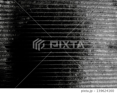 abstract horizontal striped black and white texture with dramatic left chiaroscuro shadow abstract horizontal striped black and white texture with dramatic left chiaroscuro shadow 139624160