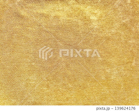 golden woven fabric texture closeup revealing intricate shimmering threads in luxurious warm yellow hues golden woven fabric texture closeup revealing intricate shimmering threads in luxurious warm yellow hues 139624176