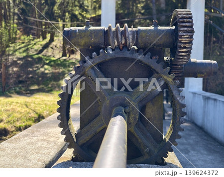 Ancient Industrial Hydraulic Components With Natural Surroundings Indicating Maintenance Activity 139624372