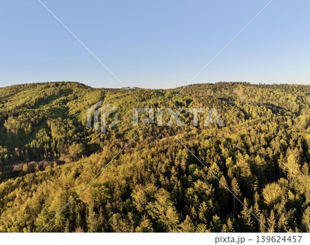 Drones Capture Expansive Views Of Colorful Forested Hills And Quiet Valley During Autumn Twilight Drones Capture Expansive Views Of Colorful Forested Hills And Quiet Valley During Autumn Twilight 139624457