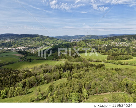 Pastoral Rural Scenery. Serene Pastoral Landscape Featuring Vibrant Farmlands And Dense Wooded Areas Pastoral Rural Scenery. Serene Pastoral Landscape Featuring Vibrant Farmlands And Dense Wooded Areas 139624524
