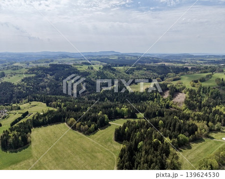Scenic View Of Forests And Fields. Picturesque Landscape With Vibrant Greenery And Airy Cloud Cover Scenic View Of Forests And Fields. Picturesque Landscape With Vibrant Greenery And Airy Cloud Cover 139624530