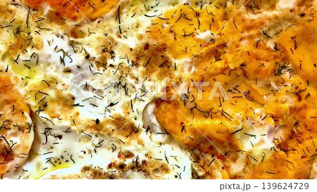 A mouthwatering egg dish infused with aromatic herbs and rich flavors that enhance every bite A mouthwatering egg dish infused with aromatic herbs and rich flavors that enhance every bite 139624729