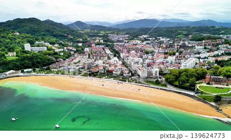 A Scenic Aerial View of a Charming Coastal Town Perfect for Relaxation and Exploration by the Beach A Scenic Aerial View of a Charming Coastal Town Perfect for Relaxation and Exploration by the Beach 139624773