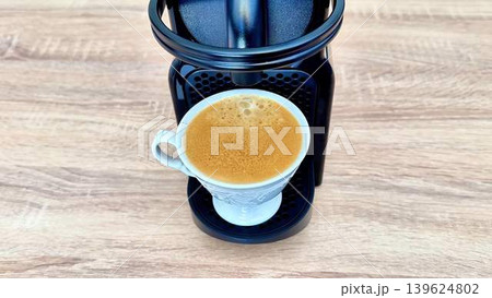 Experience the delightful process of Fresh Coffee Brewing using a Nespresso Machine today Experience the delightful process of Fresh Coffee Brewing using a Nespresso Machine today 139624802