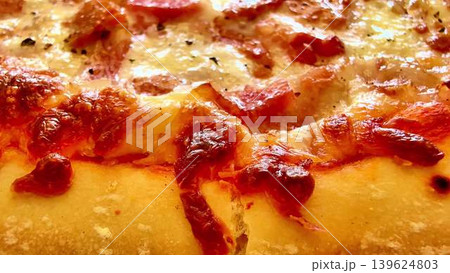 Here is a delicious and enticing closeup view of a beautifully crafted cheese and pepperoni pizza Here is a delicious and enticing closeup view of a beautifully crafted cheese and pepperoni pizza 139624803