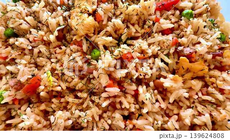 A delicious and vibrant vegetable rice dish that is bursting with flavor and colors 139624808