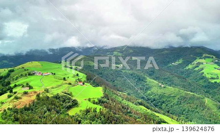 Stunning and breathtaking aerial view showcasing the lush green mountains and rolling hills Stunning and breathtaking aerial view showcasing the lush green mountains and rolling hills 139624876