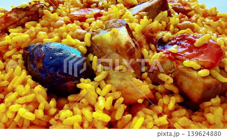 Enjoy a Delicious Chicken and Rice Dish Made with a Variety of Colorful Ingredients 139624880
