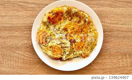 A Delicious and Fluffy Egg Omelette Served Beautifully on a Plate Ready to Enjoy 139624907