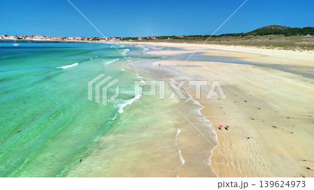 Experience a Stunning Beach Shoreline, Adorned with Crystal Clear Waters and Beauty 139624973