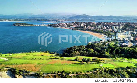 A Stunning Aerial View Captured of a Beautiful Scenic Coastal City and its Beach Area A Stunning Aerial View Captured of a Beautiful Scenic Coastal City and its Beach Area 139624986