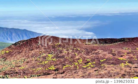 The Breathtaking and Majestic View from a Volcanic Crater Overlooking the Vast Sea of Clouds 139625032