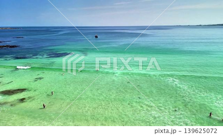 Aerial View of the Pristine and Stunning Turquoise Water at a Beautiful Scenic Beach 139625072