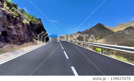 Enjoy a Scenic Coastal Road Journey That Takes You Through Beautiful Mountainous Terrain 139625078