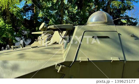 Military Vehicle in Nature A Detailed CloseUp of an Armored Car in a Natural Setting Military Vehicle in Nature A Detailed CloseUp of an Armored Car in a Natural Setting 139625177