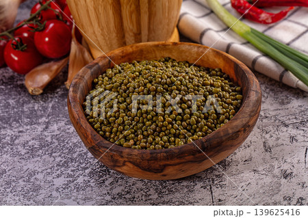 Mung beans in wooden bowl, fresh ingredients, healthy cooking 139625416