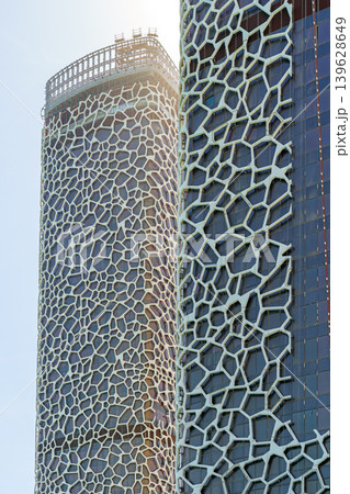 Doha, Qatar - Jan 14 2024, View of the skyscrapers with a patterned facade in the city of Lusail, at daytime, Doha, Qatar Doha, Qatar - Jan 14 2024, View of the skyscrapers with a patterned facade in the city of Lusail, at daytime, Doha, Qatar 139628649