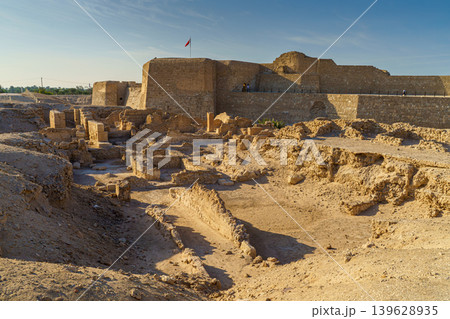 Manama, Bahrain - Jan 15 2024, Panoramic view of the ruins of the ancient fortress of Qalat Al Bahrain, included in the UNESCO World Heritage List, at daytime, Manama, Bahrain  139628935