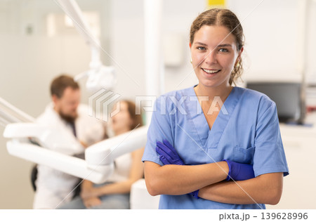 Female dentist invites you to visit dental clinic Female dentist invites you to visit dental clinic 139628996