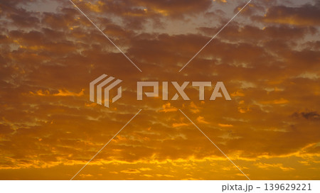 A panoramic view of colourful beatiful evening sky with pink, purple, peach and orange clouds A panoramic view of colourful beatiful evening sky with pink, purple, peach and orange clouds 139629221