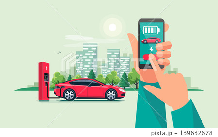 Hand with Smartphone and Charging App with Electric Car Recharging Batteries 139632678
