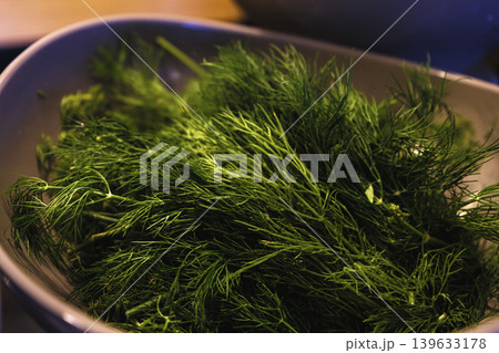 green and fresh dill in the bowl green and fresh dill in the bowl 139633178