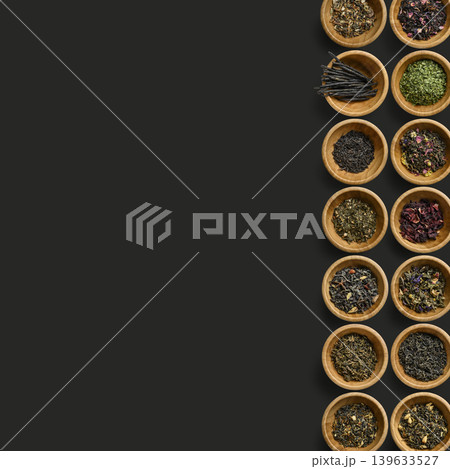 Stylish vertical arrangement of spices and herbs emphasizing wellness lifestyle imagery 139633527