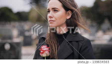 Rose, death or sad woman in graveyard for funeral. spiritual service or burial to respect the Christian religion. Mourning, depressed or person in cemetery thinking of grief, loss or goodbye farewell Rose, death or sad woman in graveyard for funeral. spiritual service or burial to respect the Christian religion. Mourning, depressed or person in cemetery thinking of grief, loss or goodbye farewell 139634563