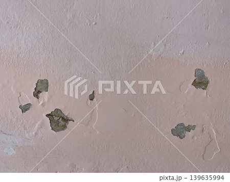 Peeling Paint And Damaged Plaster On Interior Wall Surface 139635994