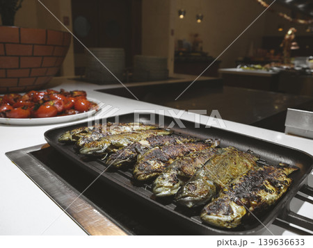 freshly cooked fish on the grill 139636633