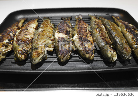 freshly cooked fish on the grill 139636636
