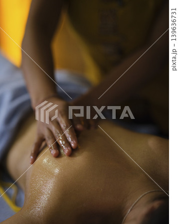 man getting massage at spa 139636731