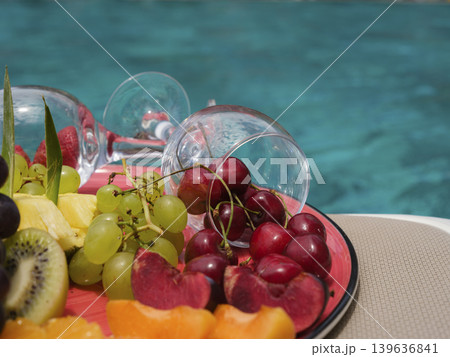 fresh fruits by the pool 139636841