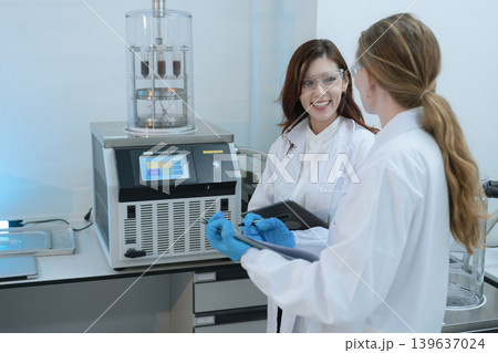 Scientist biotechnologist testing new chemical substances in a laboratory. 139637024