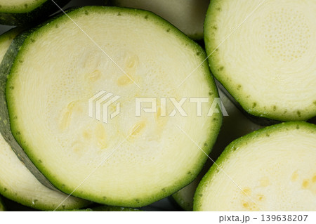 Close-up Pattern of Organic Green Zucchini Slices Close-up Pattern of Organic Green Zucchini Slices 139638207