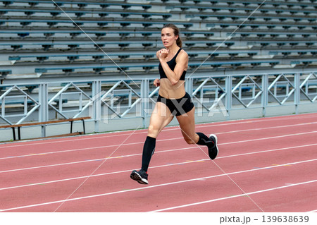 Woman athlete running Woman athlete running 139638639