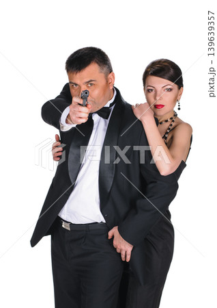 Young couple with gun Young couple with gun 139639357