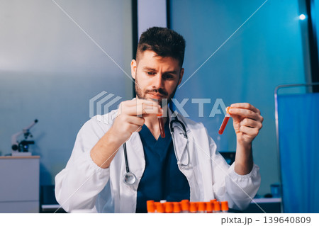 Attractive student of chemistry working in laboratory Attractive student of chemistry working in laboratory 139640809