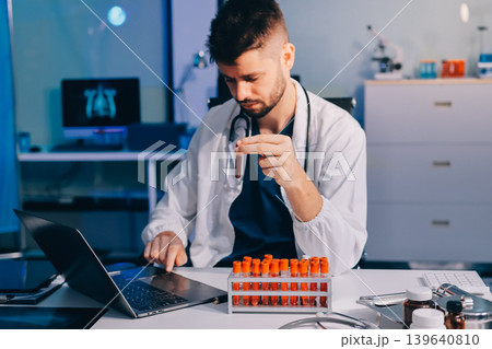 Attractive student of chemistry working in laboratory 139640810
