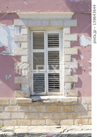 Old characteristic window in Larnaka, Cyprus Old characteristic window in Larnaka, Cyprus 139643644