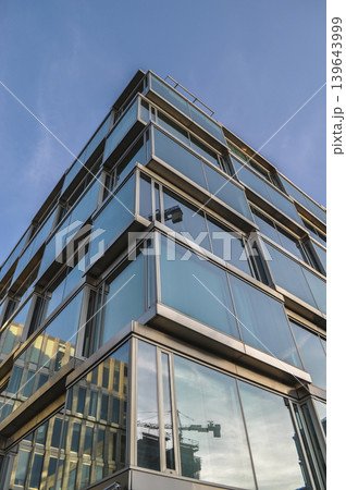 glass office building blue architecture office district glass office building blue architecture office district 139643999