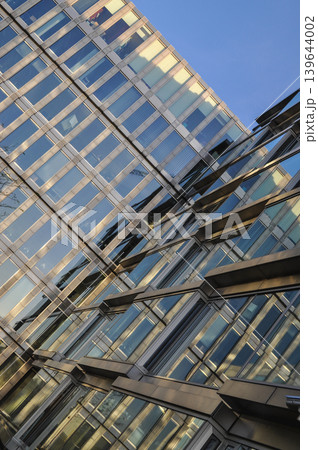 glass office building blue architecture office district 139644002