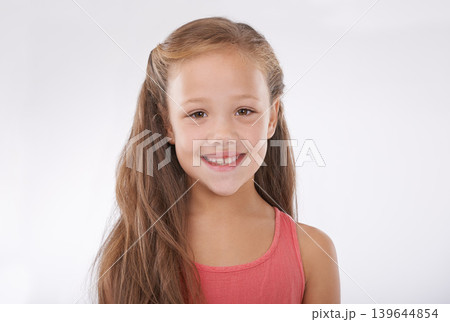 Portrait, girl and child on studio with smile, confidence and good mood isolated on a white background. Happy young kid with pride, positivity and cheerful expression from New Zealand at mockup space Portrait, girl and child on studio with smile, confidence and good mood isolated on a white background. Happy young kid with pride, positivity and cheerful expression from New Zealand at mockup space 139644854