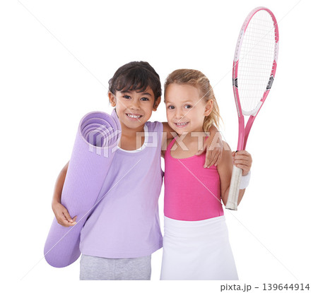 Tennis, sports and portrait of kids hug on a white background for training, workout and exercise. Fitness, happy friends and isolated children with yoga mat, racket and equipment for hobby in studio Tennis, sports and portrait of kids hug on a white background for training, workout and exercise. Fitness, happy friends and isolated children with yoga mat, racket and equipment for hobby in studio 139644914